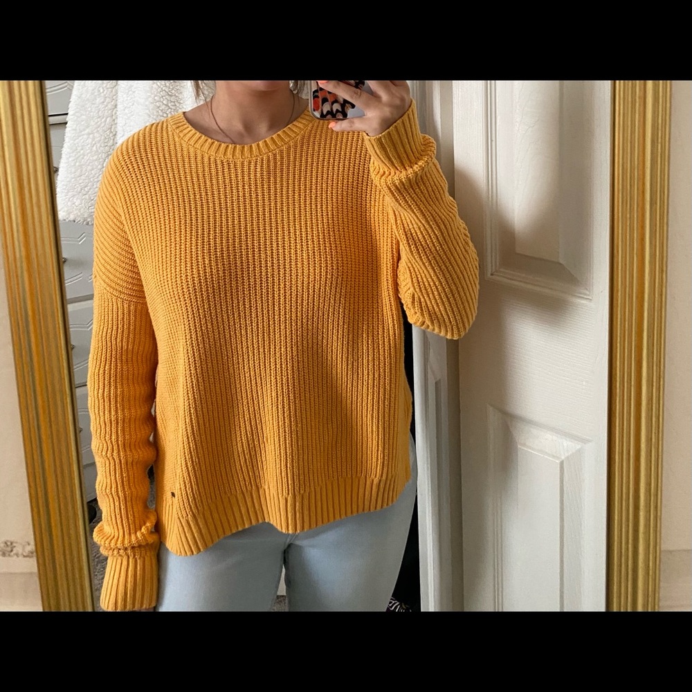 yellow sweater
